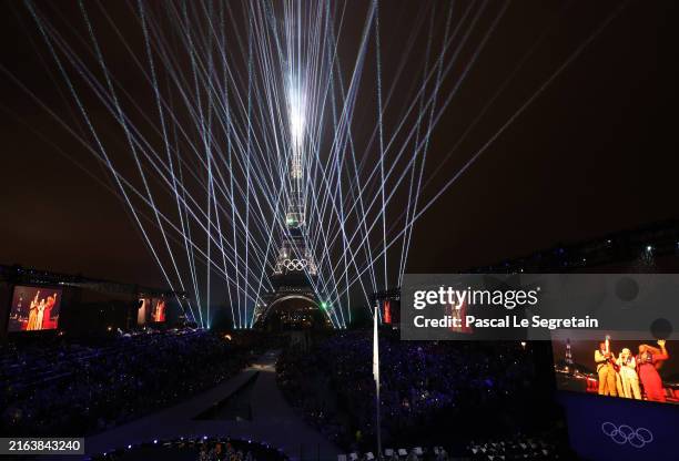 Light Show takes place as The Olympic Rings on the Eiffel Tower are illuminated during the opening ceremony of the Olympic Games Paris 2024 at Place...