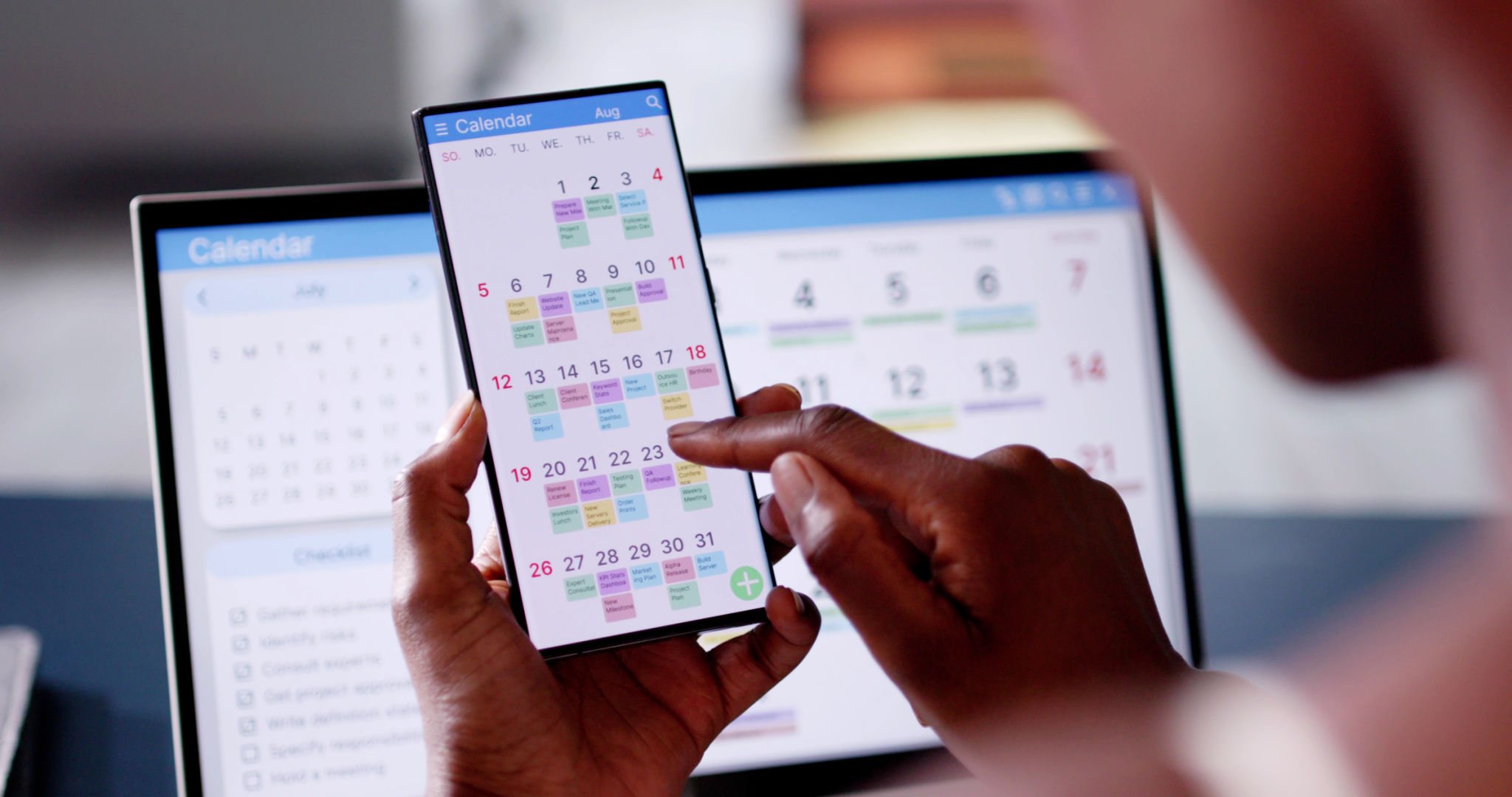 African Woman Organizing Appointment Schedule Using Cellphone And Calendar African Woman Organizing Appointment Schedule Using Cellphone And Calendar