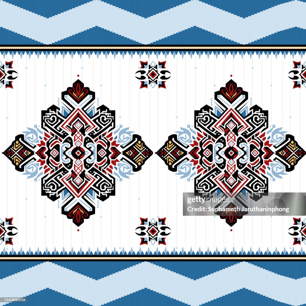 Intricate Geometric Ethnic Pattern in Blue and Red Tones.