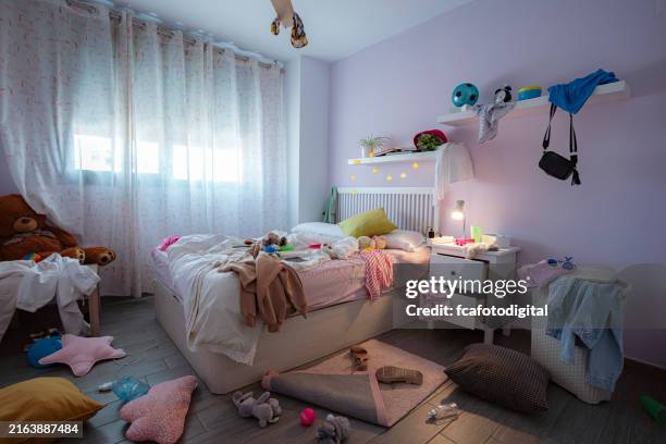 messy and cluttered teenager girl bedroom - sovrum bildbanksfoton och bilder