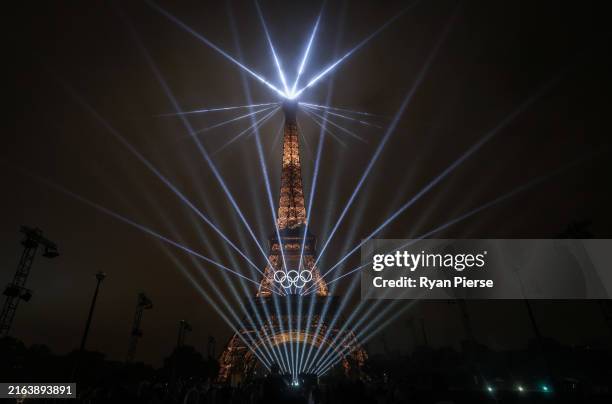 Light Show takes place as The Olympic Rings on the Eiffel Tower are illuminated during the opening ceremony of the Olympic Games Paris 2024 at Place...