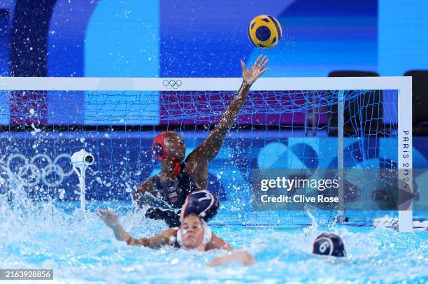 Ashleigh Johnson of Team United States attempts to make a save during the Women's Preliminary Round - Group B match between Team Greece and Team...