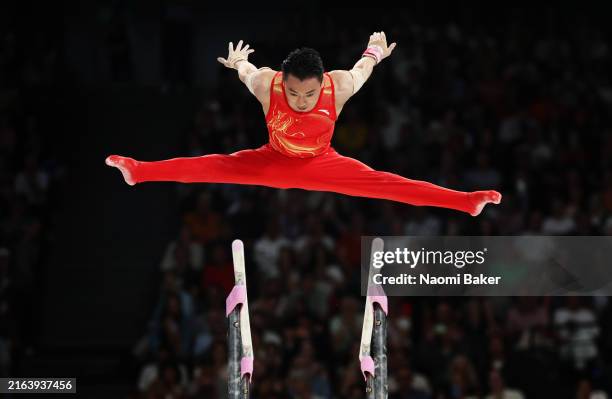 Zou Jingyuan of Team China competes on the parallel bars during the Artistic Gymnastics Men's Qualification on day one of the Olympic Games Paris...