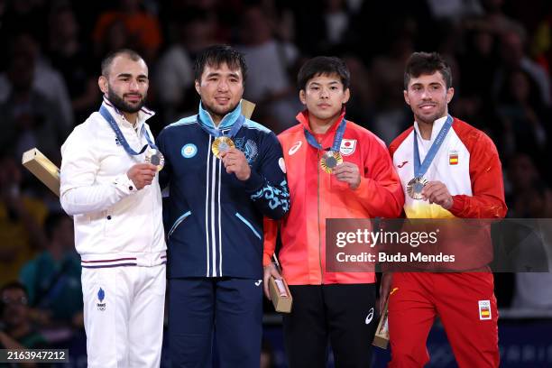 Gold medalist Yeldos Smetov of Team Kazakhstan , Silver medalist Luka Mkheidze of Team France and Bronze medalists Ryuju Nagayama of Team Japan and...
