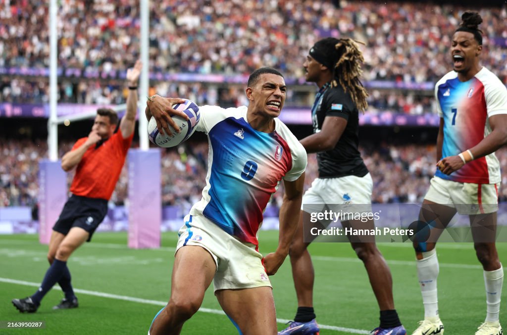 Aaron Rathor Rugby Aaron Grandidier Nkanang of Team France celebrates after scoring his ...