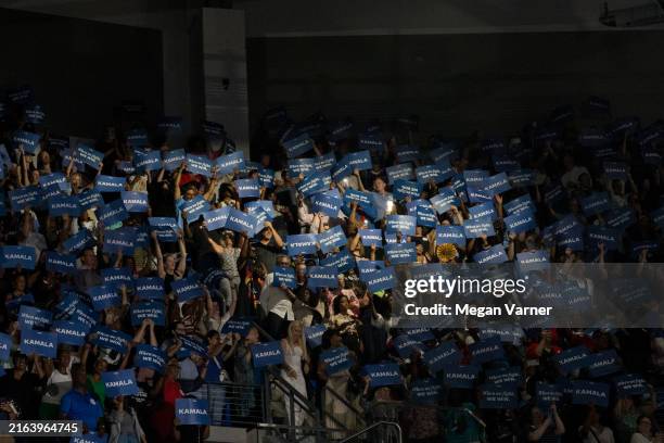 Supporters cheer Democratic presidential candidate, U.S. Vice President Kamala Harris at a campaign event at the Georgia State Convocation Center on...