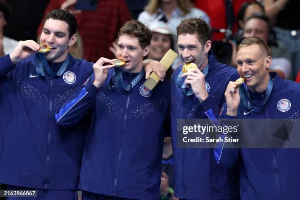 Gold Medalists, Jack Alexy, Chris Guiliano, Hunter Armstrong and Caeleb Dressel of Team United States pose with their medals during the Medal...