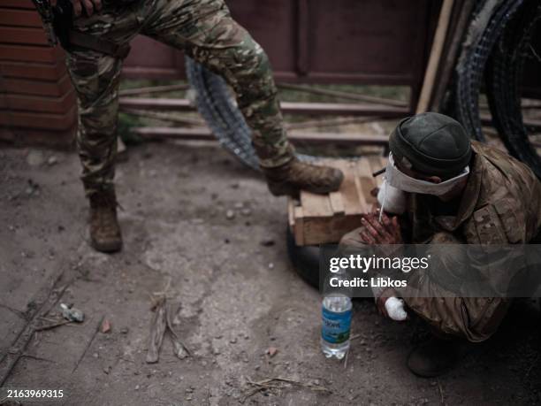 Wounded Russian prisoner of war who was given medical aid, who was given medical aid by the Ukrainian military on July 30, 2024 in Donetsk Region,...