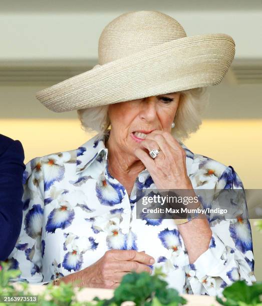 Queen Camilla watches her house 'Handcuffed' run in the Princess Margaret Stakes as she attends the QIPCO King George Day at Ascot Racecourse on July...