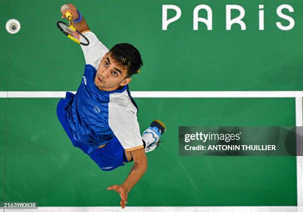 India's Lakshya Sen plays a shot Indonesia's Jonatan Christie in their men's singles badminton group stage match during the Paris 2024 Olympic Games...