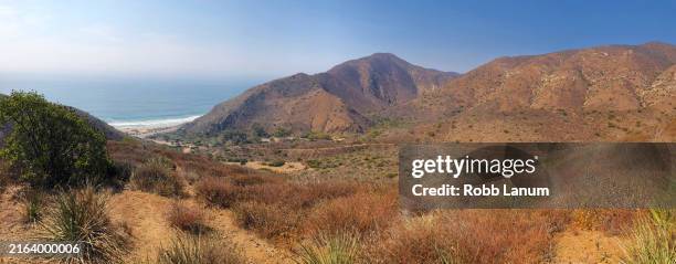hiking point mugu - where the santa monica mountains meet the pacific ocean - mugu rock stock pictures, royalty-free photos & images