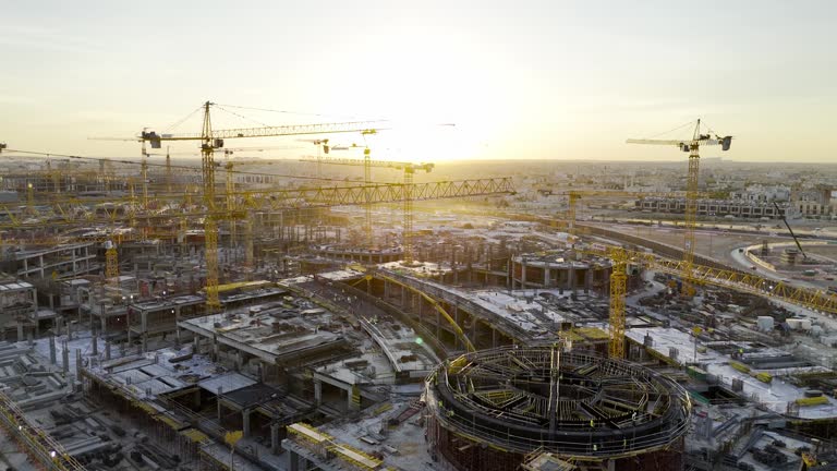 https://media.gettyimages.com/id/2164003074/video/drone-view-of-mega-construction-of-saudi-arabia-on-the-sunset-with-plenty-of-cranes.jpg?b=1&s=640x640&k=20&c=G1fVp0q4oJqev0xpYwtzX-ObH7a5sdyS08ZoRhx0rFg=