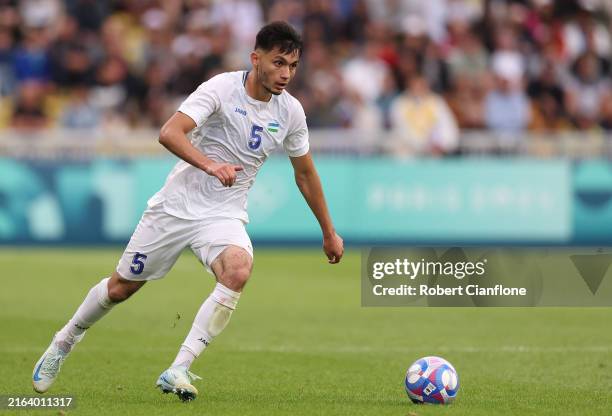 Muhammadkodir Hamraliev of Team Uzbekistan during the Men's group C match between Uzbekistan and Dominican Republic during the Olympic Games Paris...