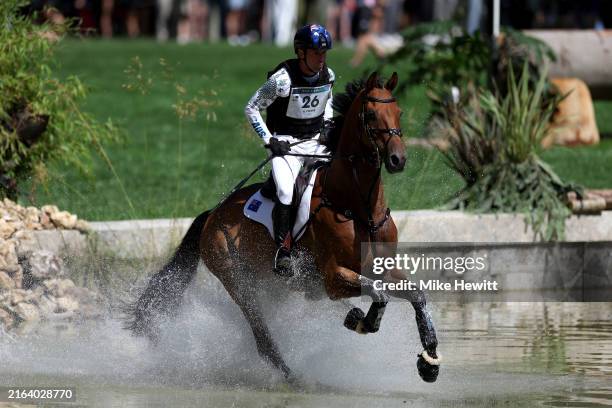 Kevin McNab and horse Don Quidam of Team Australia compete during the Equestrian Eventing Individual Cross Country leg on day two of the Olympic...