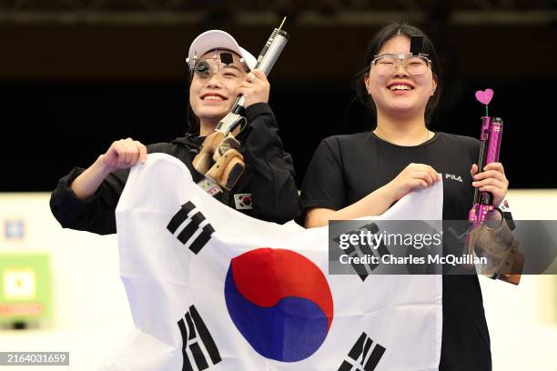 Gold medalist Oh Ye Jin of Team Republic of Korea and Silver medalist Kim Yeji of Team Republic of Korea celebrate following the Women's 10m Air...
