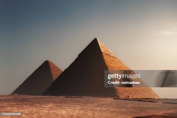 the great pyramid of giza, largest egyptian pyramid. giza pyramids complex landscape. - egypt stock pictures, royalty-free photos & images