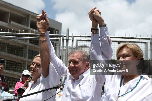 Opposition candidate Edmundo González of the Plataforma Unitaria Democrática Coalition waves after casting his vote during the presidential elections...