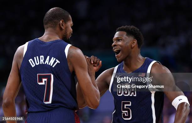 Kevin Durant and Anthony Edwards of Team United States high five during the first half of the Men's Group Phase - Group C game between Serbia and the...