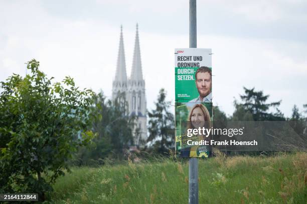 Election poster of the party Christlich Demokratische Union, CDU, with portrait of soxon prime minister Michael Kretschmer and inscription: 'Recht...