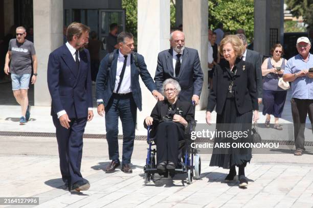 Aimone di Savoia Aosta greets Princess Irene of Greece and Denmark and Queen Sofia of Spain during the funeral of Prince Michael of Greece and...