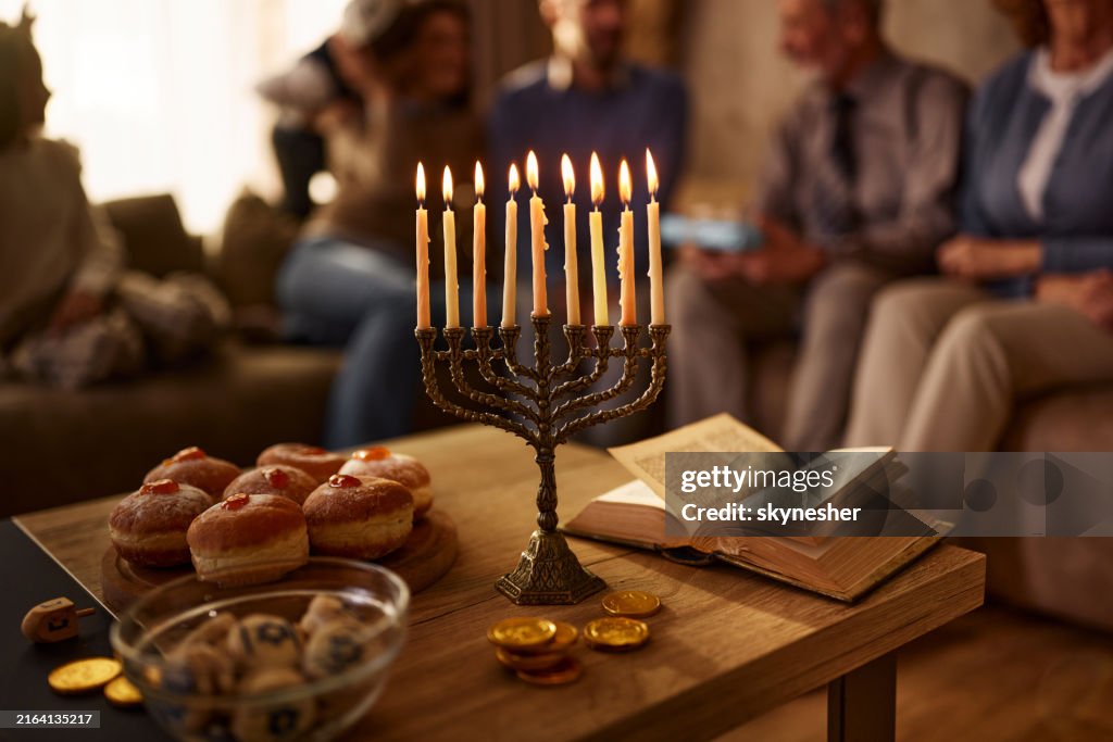 Traditional food and menorah for Hanukkah.