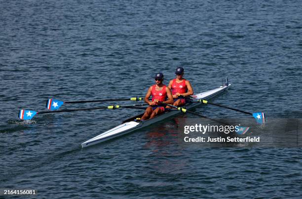 Eber Sanhueza and Cesar Abaroa of Team Chile sail to the the start line prior to the Lightweight Men's Double Sculls repechage on day three of the...
