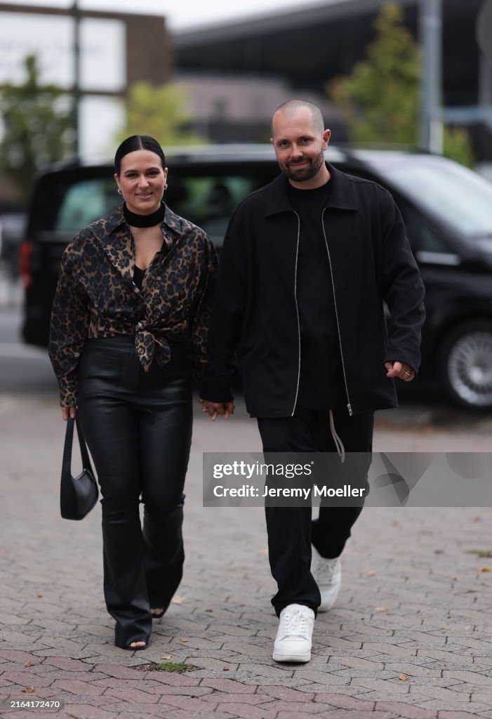 Samuel Riani Lou Beyer seen wearing RIANI animal printed blouse and RIANI black ...