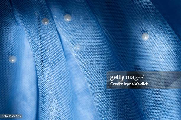 texture of gorgeous flowy tutu tuile nylon skirt in natural pastel blue colors. abstract wavy background in pastel blue, turquoise color with pearls, in style pop-art style. trendy background for your product. - blue dress stock pictures, royalty-free photos & images