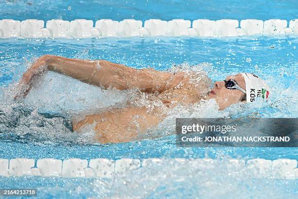 Hungary's Hubert Kos competes in the final of the men's 200m backstroke swimming event during the Paris 2024 Olympic Games at the Paris La Defense...