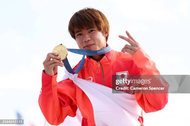 Gold medalist Yuto Horigome of Team Japan poses on the podium during the Men's Street Finals on day three of the Olympic Games Paris 2024 at Place de...