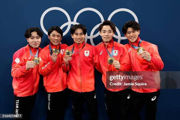 Shinnosuke Oka, Wataru Tanigawa, Kazuma Kaya, Takaaki Sugino and Daiki Hashimoto of Team Japan pose with their gold medals during the medal ceremony...