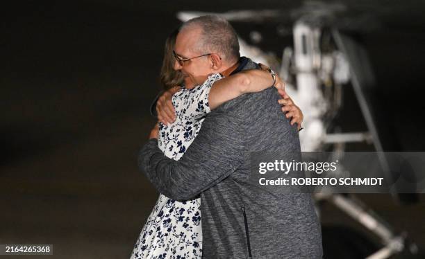 Former US Marine Paul Whelan hugs his sister Elizabeth Whelan as he arrives at Joint Base Andrews in Maryland on August 1, 2024. Journalist Evan...