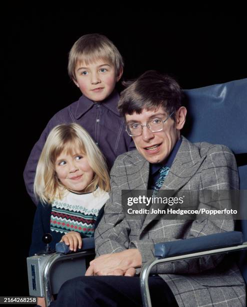 English theoretical physicist Stephen Hawking posed with his son Robert and daughter Lucy in Cambridge, England circa 1978. Hawking was a Professor...