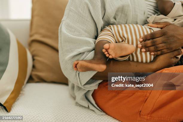 creating a strong mother-baby connection - baby closeup stock pictures, royalty-free photos & images