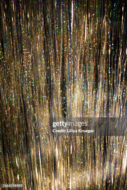 tinsel holiday background. - lametta stock-fotos und bilder