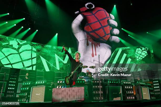 Billie Joe Armstrong and Tré Cool of Green Day perform onstage as Green Day kicks off their Saviors North America Stadium Tour at Nationals Park on...