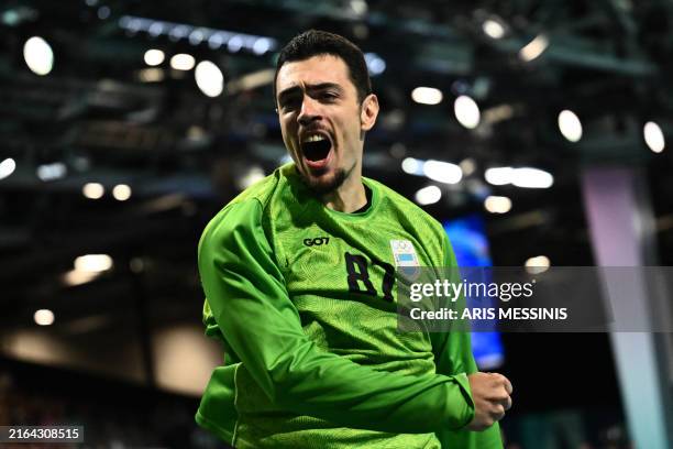Argentina's goalkeeper Juan Bar reacts during the Men's Preliminary Round Group B handball match between Argentina and France of the Paris 2024...