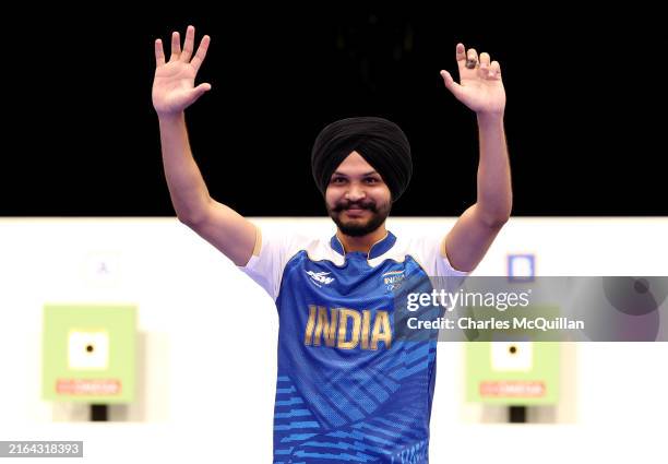 Sarabjot Singh of Team India celebrates winning the bronze medals with Manu Bhaker after competing in the Shooting 10m Air Pistol Mixed Team Bronze...