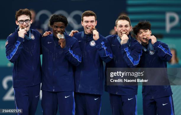 Bronze medalists Paul Juda, Frederick Richard, Stephen Nedoroscik, Brody Malone and Asher Hong of Team United States pose with their medals during...