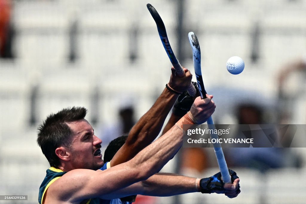 TOPSHOT-FHOCKEY-OLY-PARIS-2024-AUS-IND