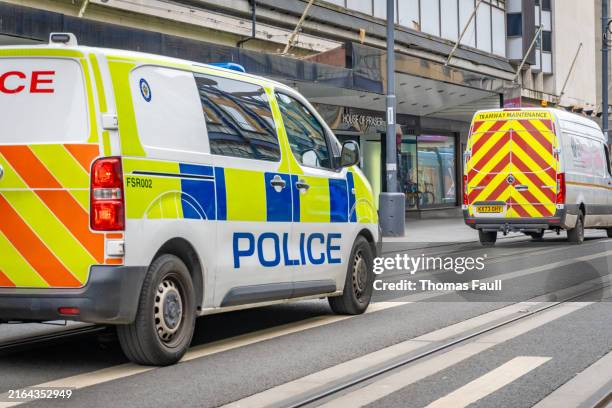 police van drives through birmingham - west midlands stock pictures, royalty-free photos & images