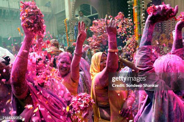 Hindu widows living in Vrindavan, Uttar Pradesh, India, played Holi at the historic Gopinath temple, breaking from traditions that otherwise expect...