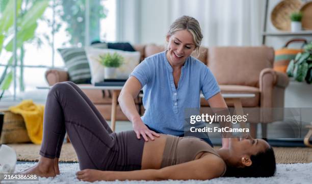 prenatal physiotherapy - pelvic floor stock pictures, royalty-free photos & images