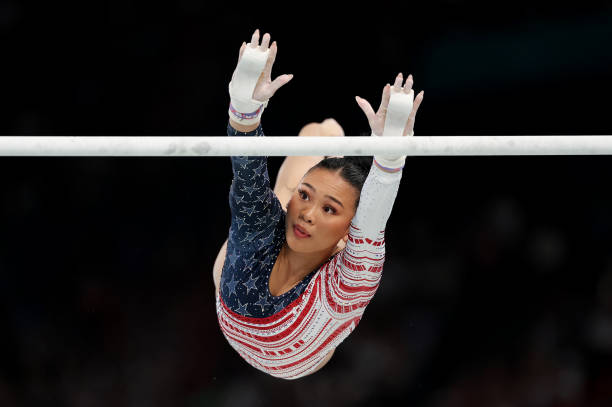 Sunisa Lee of Team United States competes on the uneven bars during the Artistic Gymnastics Women's Team Final on day four of the Olympic Games Paris...
