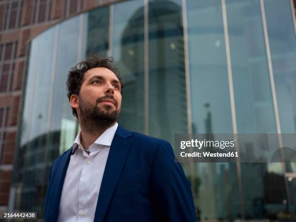 Man In Building 2,931 Business Man Standing In Front Of Building Stock Photos, High-Res ...