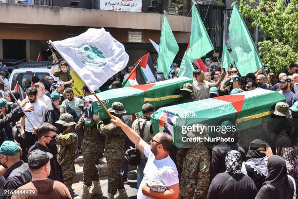 Members of the Palestinian Joint Action Committee are holding a rally and a symbolic funeral for late Hamas leader Ismail Haniyeh in Beirut, Lebanon,...