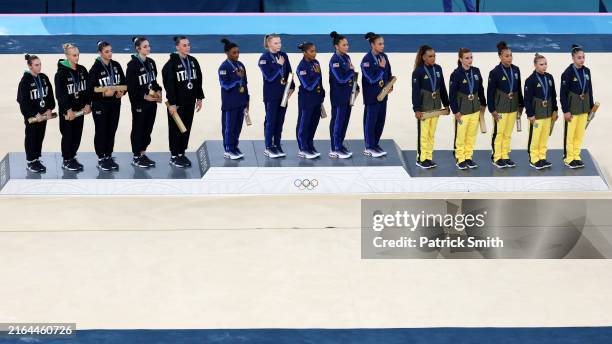Gold medalists Team United States , Silver medalists Team Italy and Bronze medalists Team Brazil line up for the national anthem during the medal...