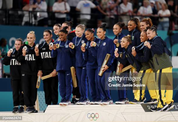 Silver medalists Team Italy, Gold medalists Team United States and Bronze medalists Team Brazil pose on the podium during the medal ceremony for the...