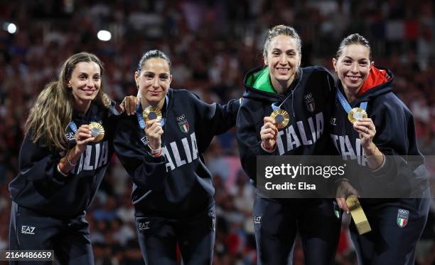 Gold medalists of Team Italy celebrate on the podium during the Fencing Women's Epee medal ceremony on day four of the Olympic Games Paris 2024 at...