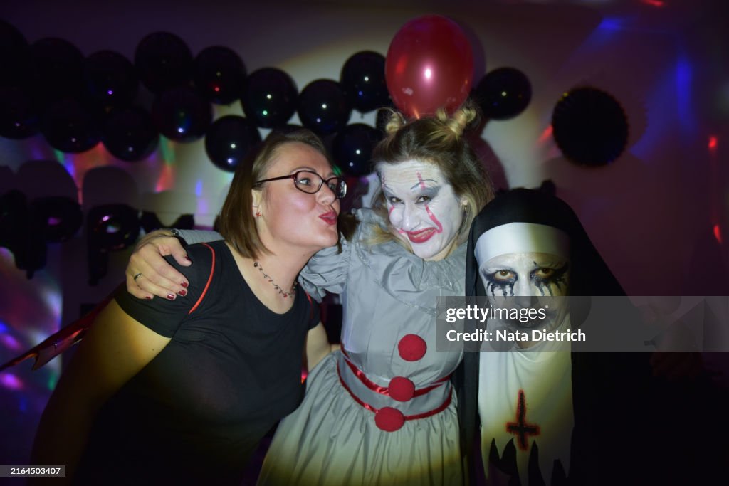 Halloween party with people in costumes